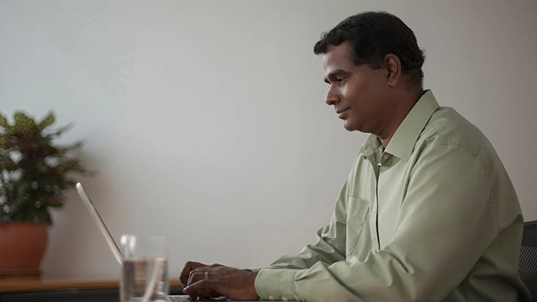 Man at computer desk